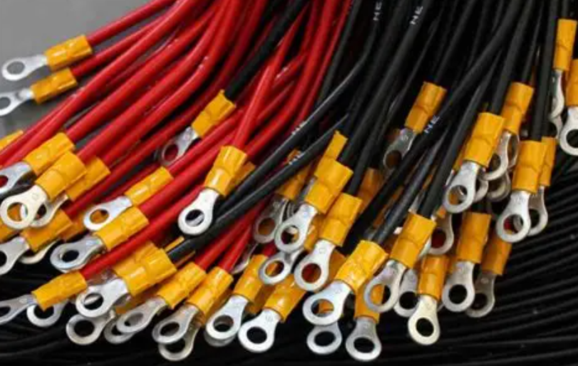 Close-up product photo of an industrial copper-strand electrical cable with black insulation jacket