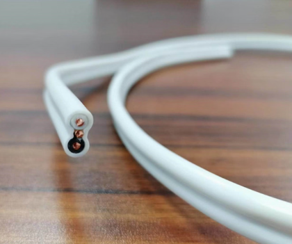 Close-up product photo of an industrial copper-strand electrical cable with black insulation jacket