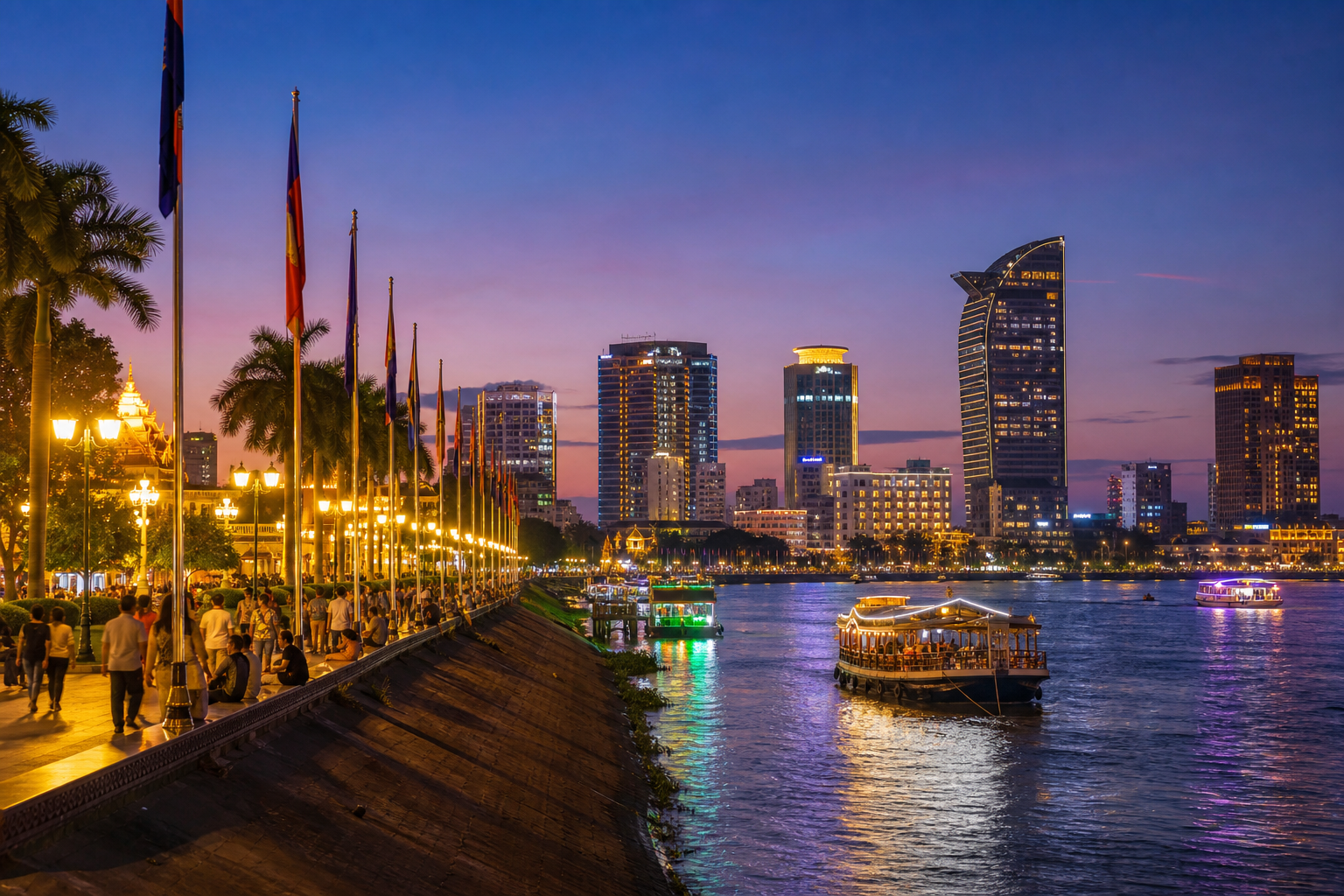 Twilight view of Phnom Penh riverfront with modern skyline and lively promenade