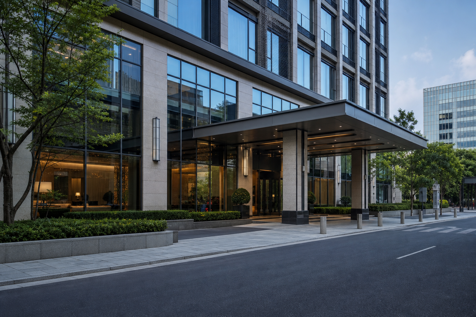 Refined commercial hotel exterior with clean glass facade, balanced landscaping, and professional urban streetscape in daylight
