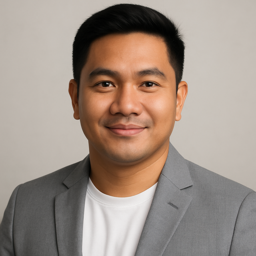 Portrait of a Filipino electrical technician in a light gray blazer