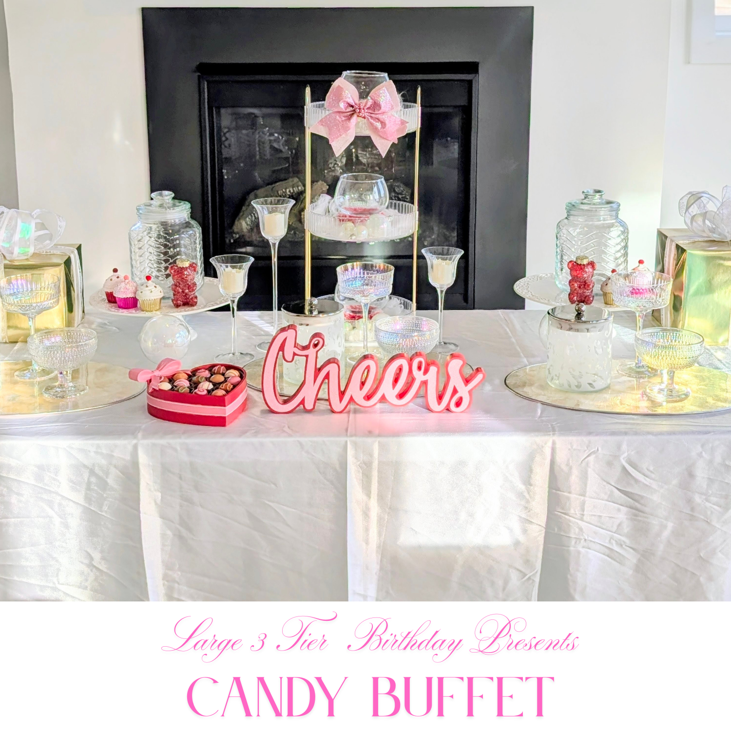 Wedding candy buffet with ivory draping, crystal jars, and neutral floral styling