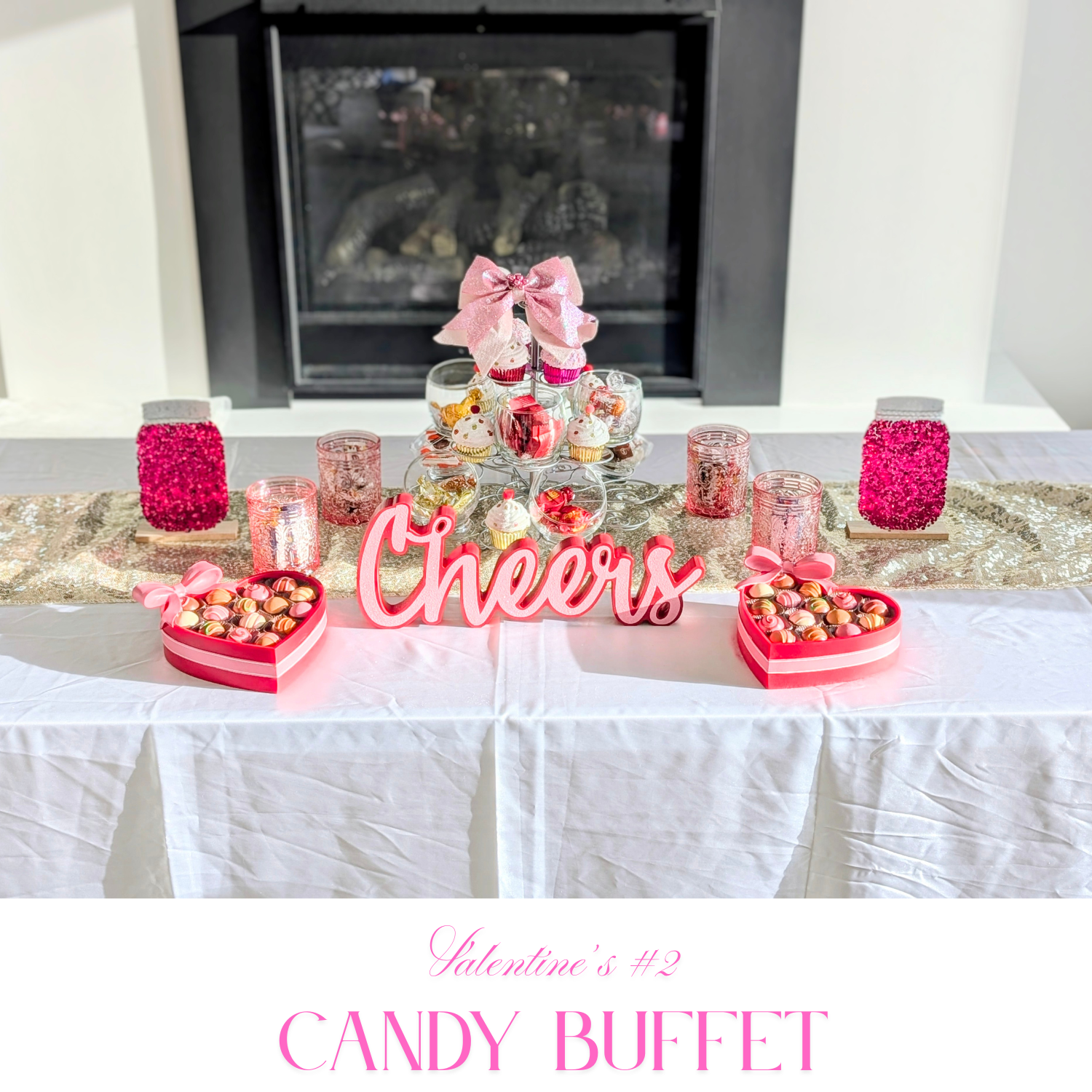 Valentine's Day #2 candy buffet setup with tiered dessert stand, pink accents, heart-shaped candy trays, and Cheers sign