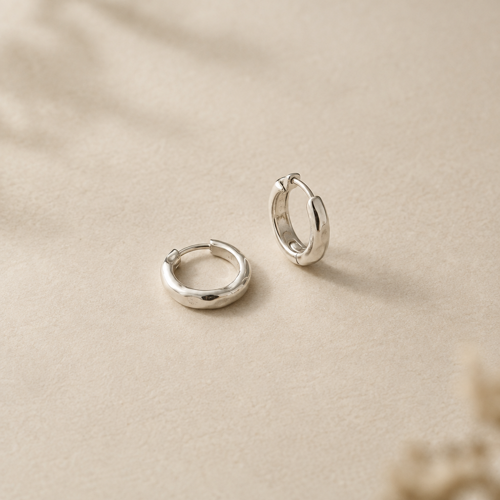 Pair of petite handcrafted silver hoop earrings