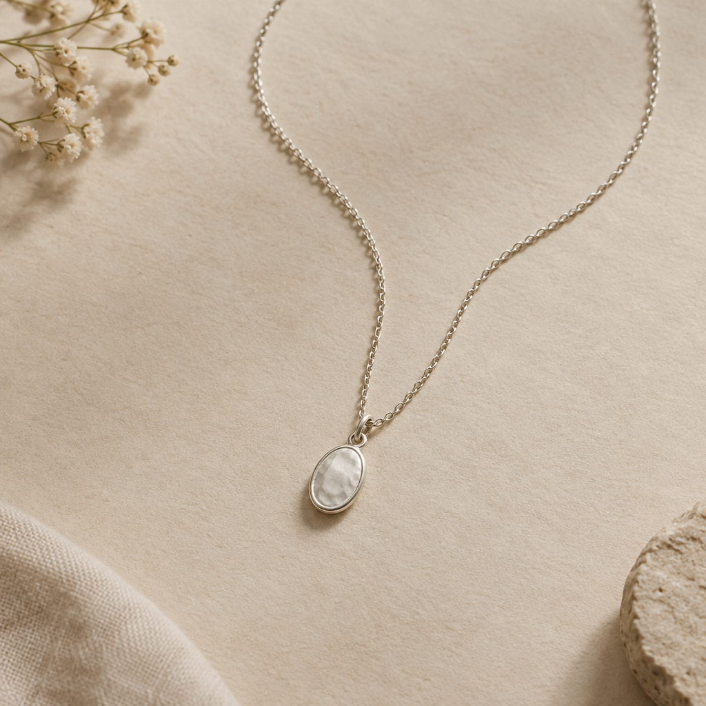 Delicate silver pendant necklace with a fine chain