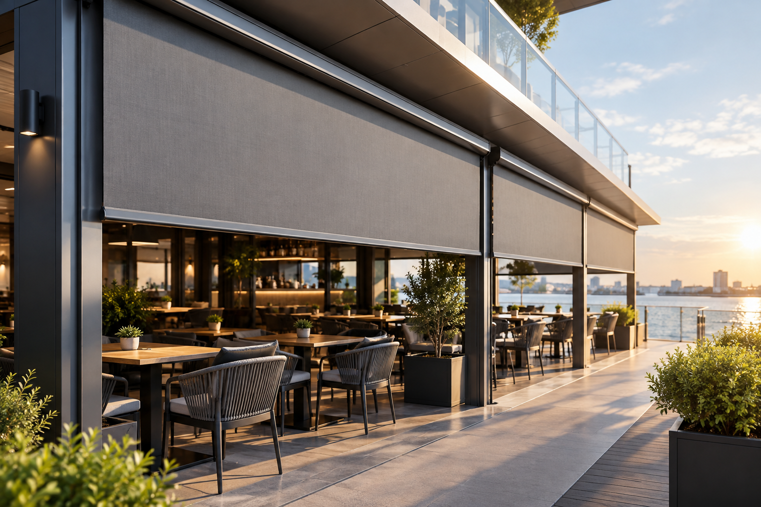 Exterior-facing outdoor blind system shading a semi-open commercial terrace