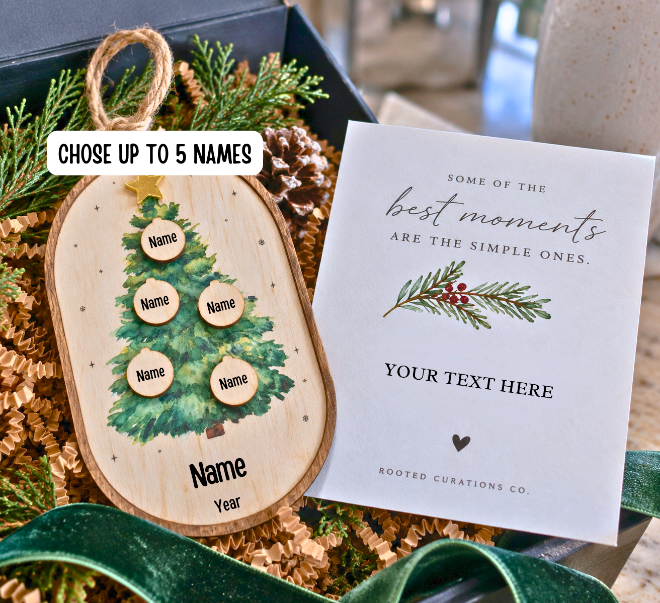 Holiday At Home gift box with cream knit throw, brass candle snuffer, and handwritten family card arranged on a bright kitchen table