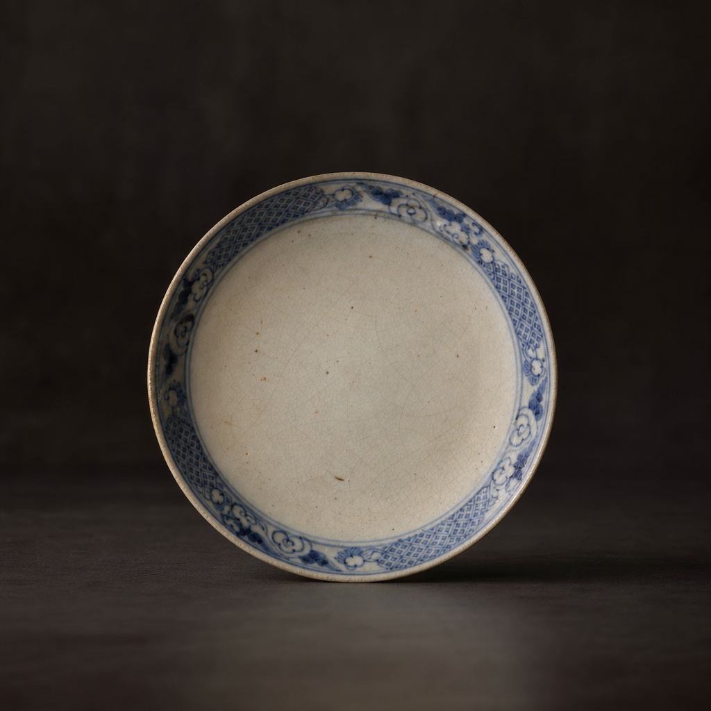 Antique Plate I, shallow porcelain serving plate with faded cobalt rim and hairline glaze