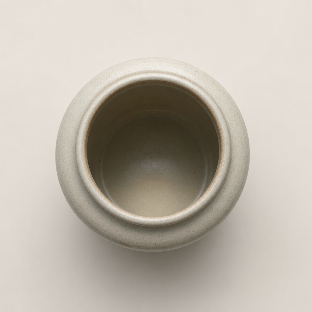 Top view of the jar showing rounded lip and smooth glaze