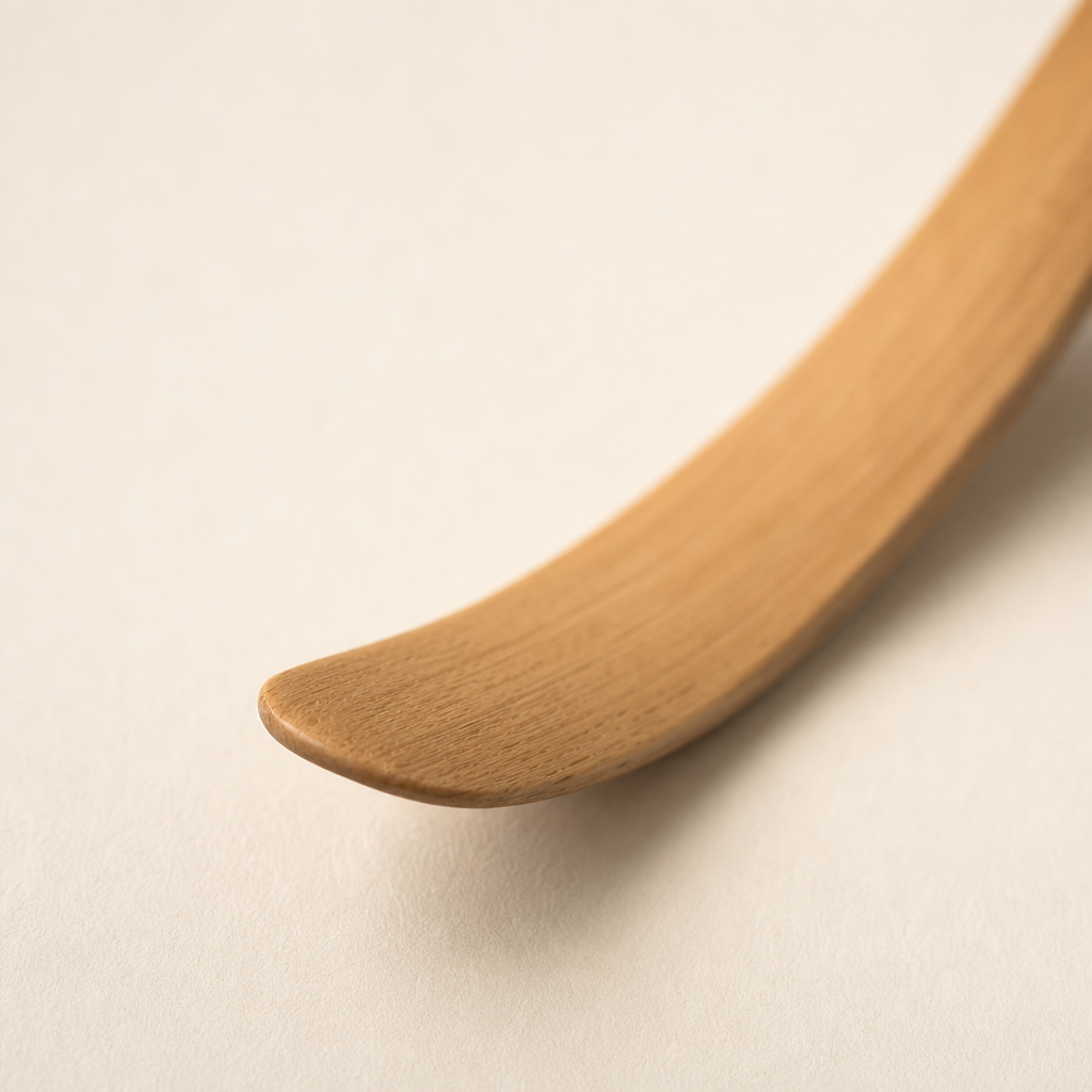 Close-up of the polished scoop tip with smooth matte finish