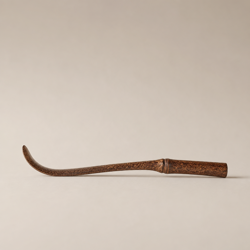 Side profile showing gentle curve and thicker handle