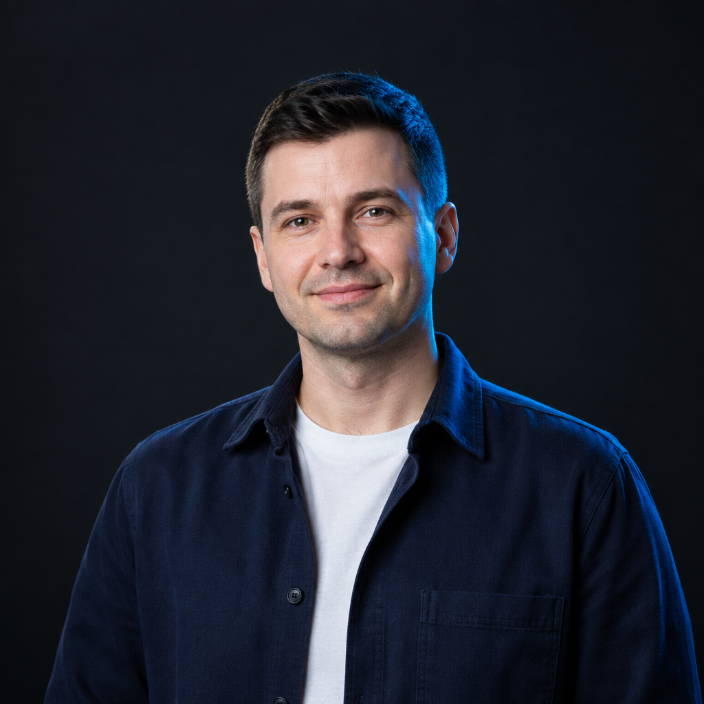 Dmytro Melnyk, with short dark hair and a navy overshirt