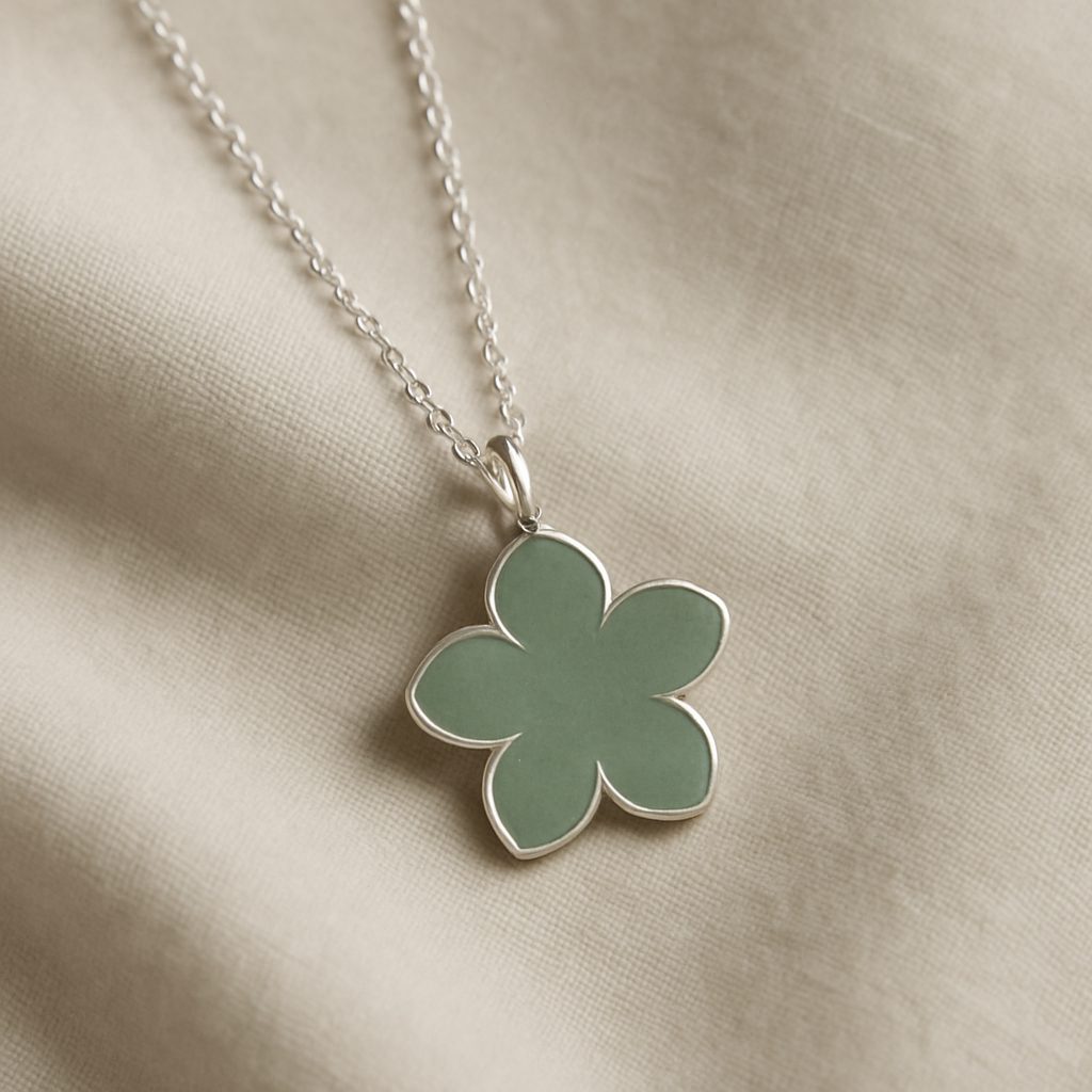 Sage green enamel petal necklace on a delicate chain