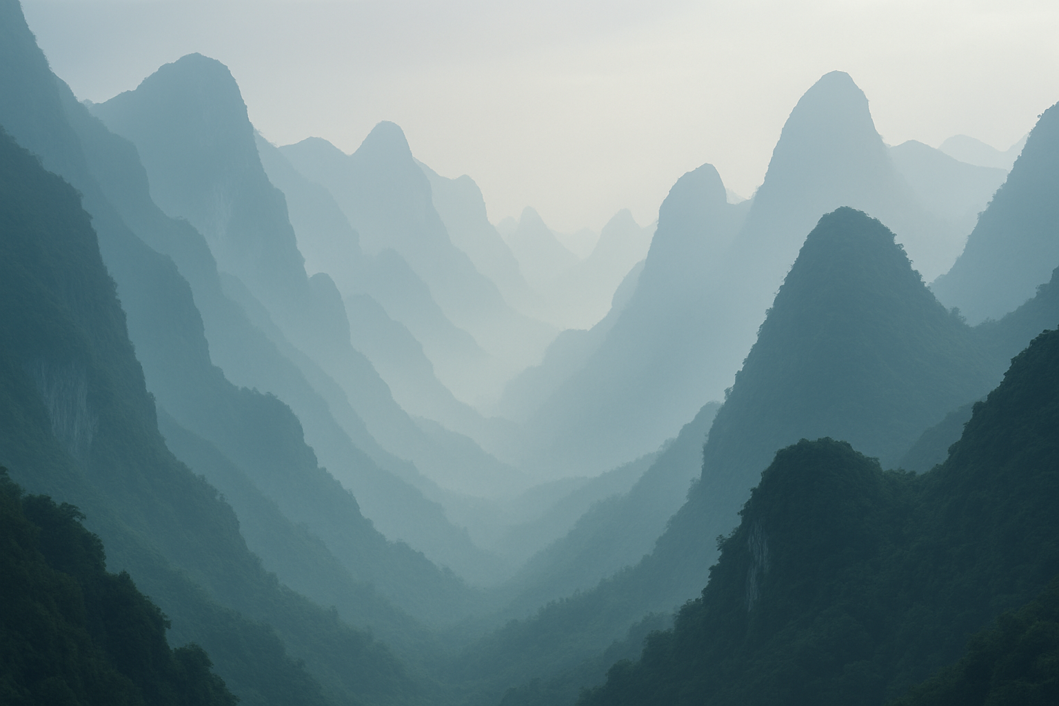Misty mountain ridges and layered peaks in China