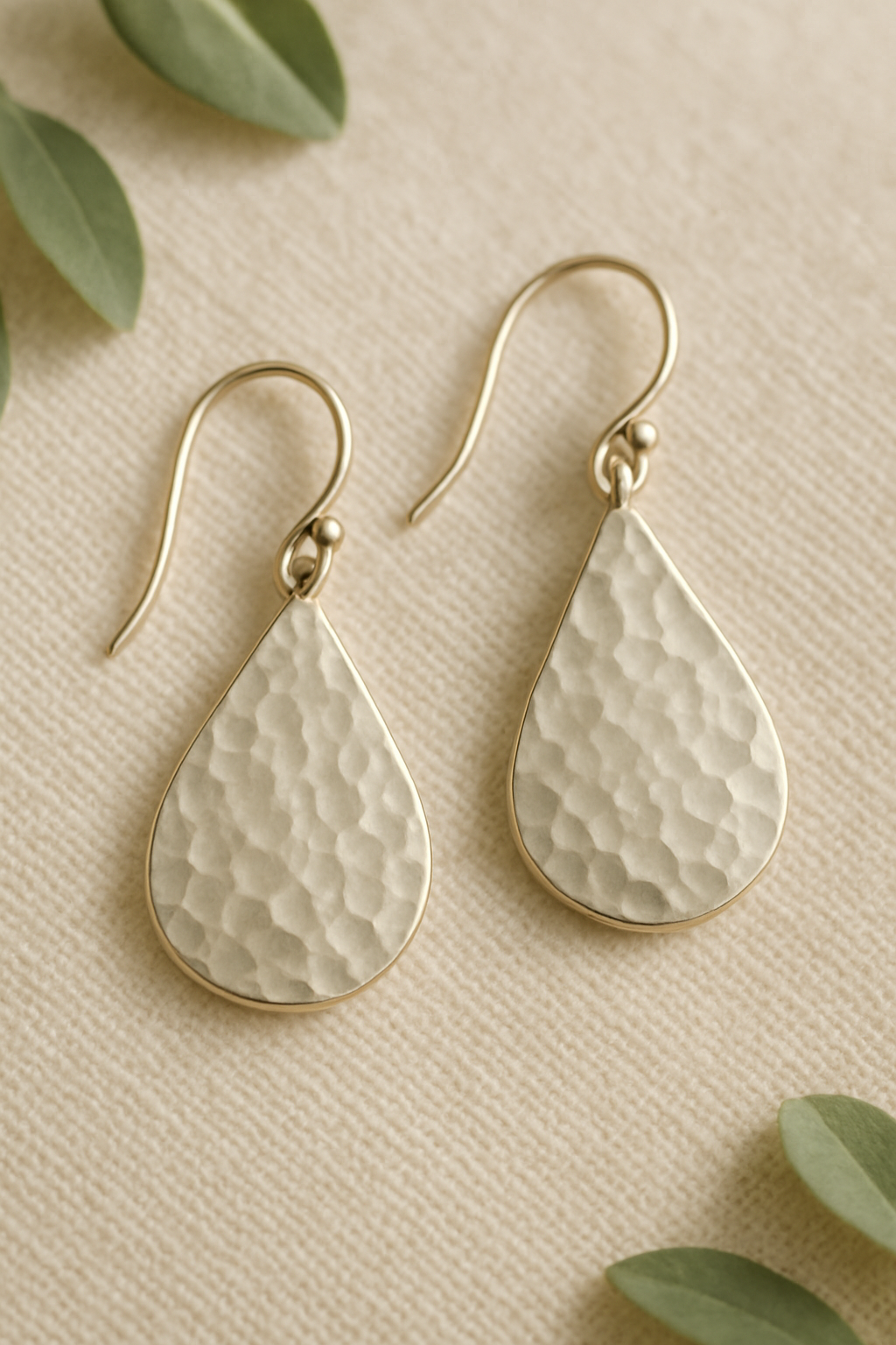 Hammered silver drop earrings with organic silhouette