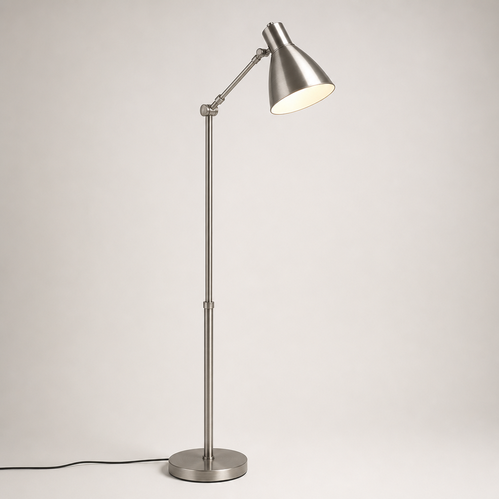 Tall brushed metal floor lamp with slim pole and adjustable cone shade