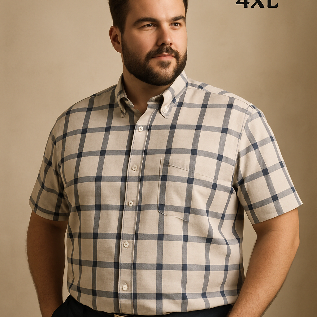 Confident male model wearing a checked 4XL AVANELLI short-sleeve shirt, showcasing fit and style.
