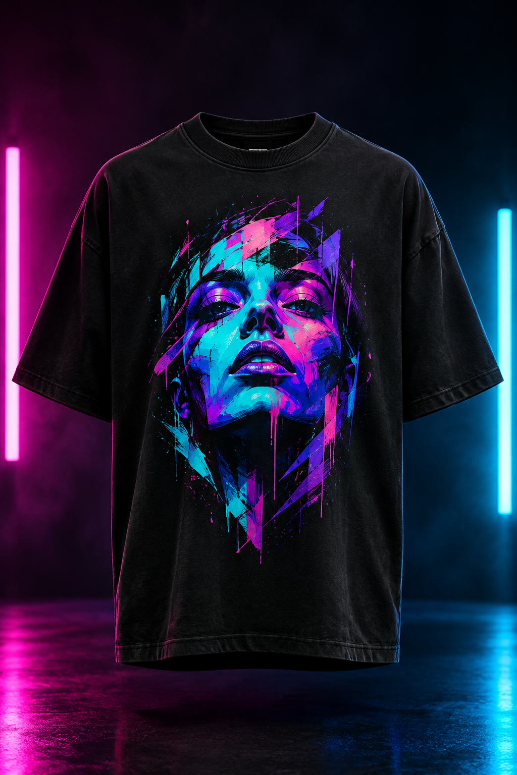 Black oversized graphic t-shirt with a vivid neon abstract face illustration on the chest