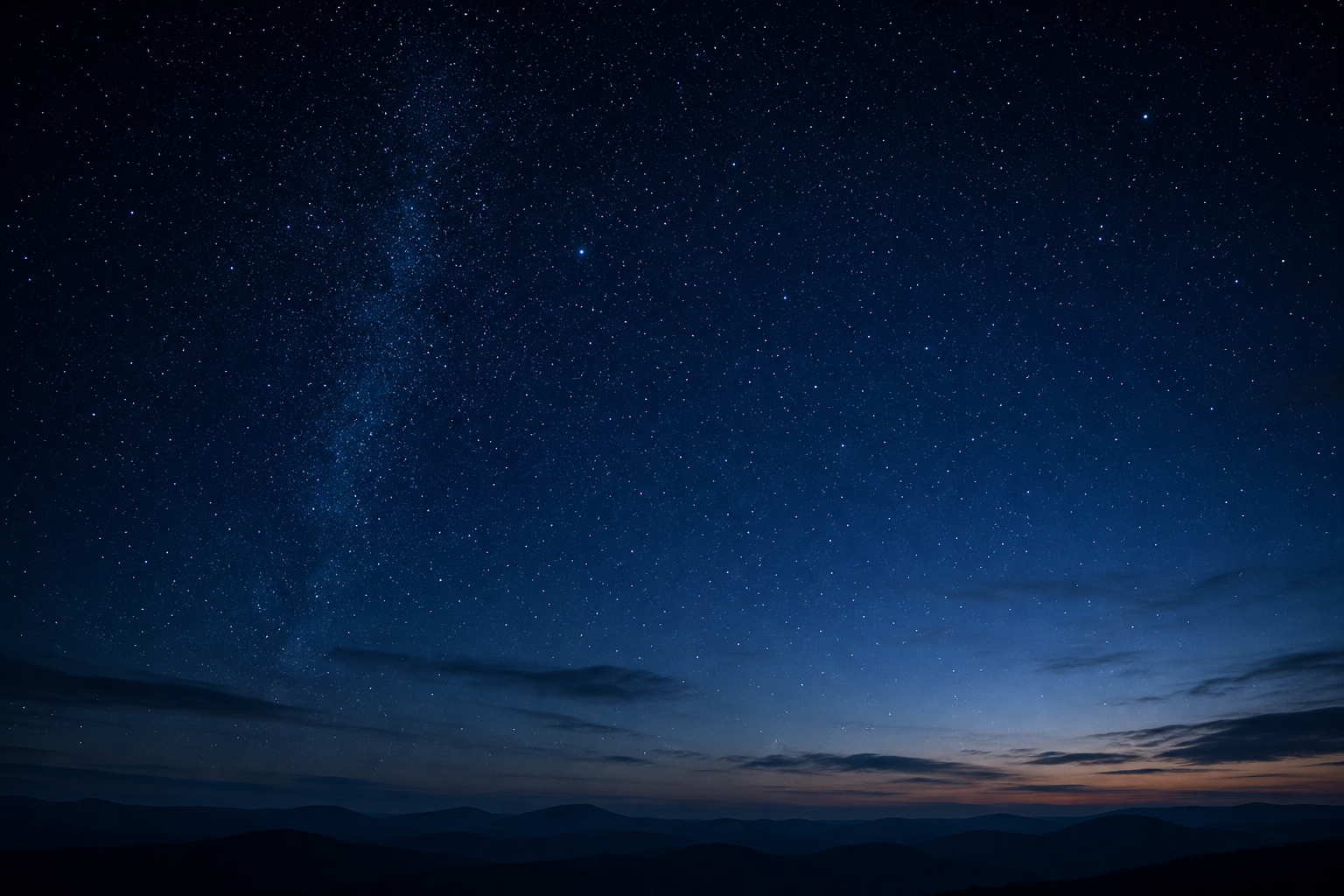 Deep clear night sky with visible stars and subtle navy-to-indigo gradient tones, calm and realistic