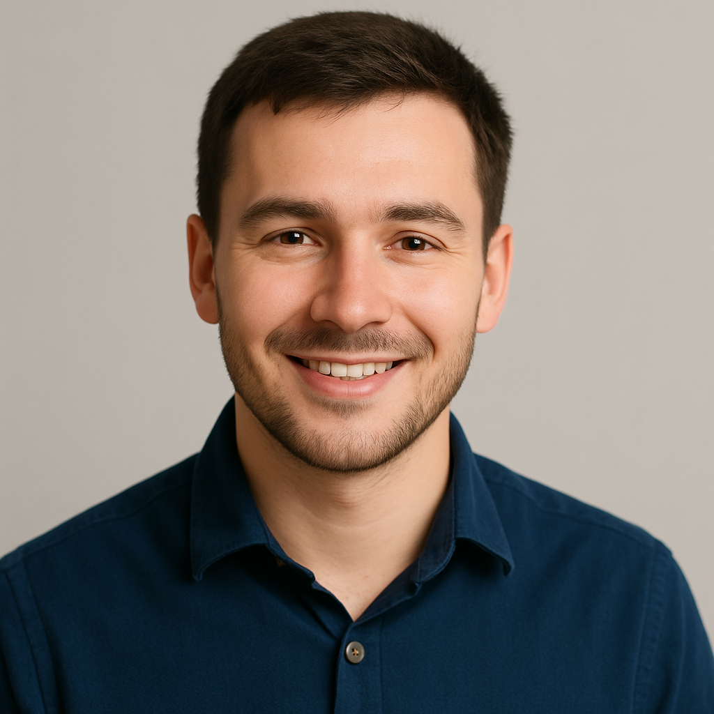 Portrait of Andriy Kovalenko, a young IT professional with short dark hair