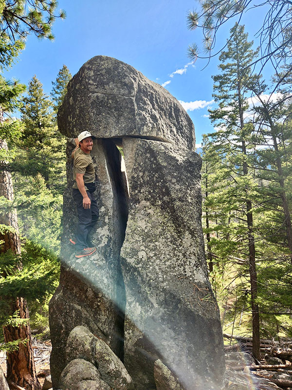 Wesley Richard coaching an athlete, focused and attentive