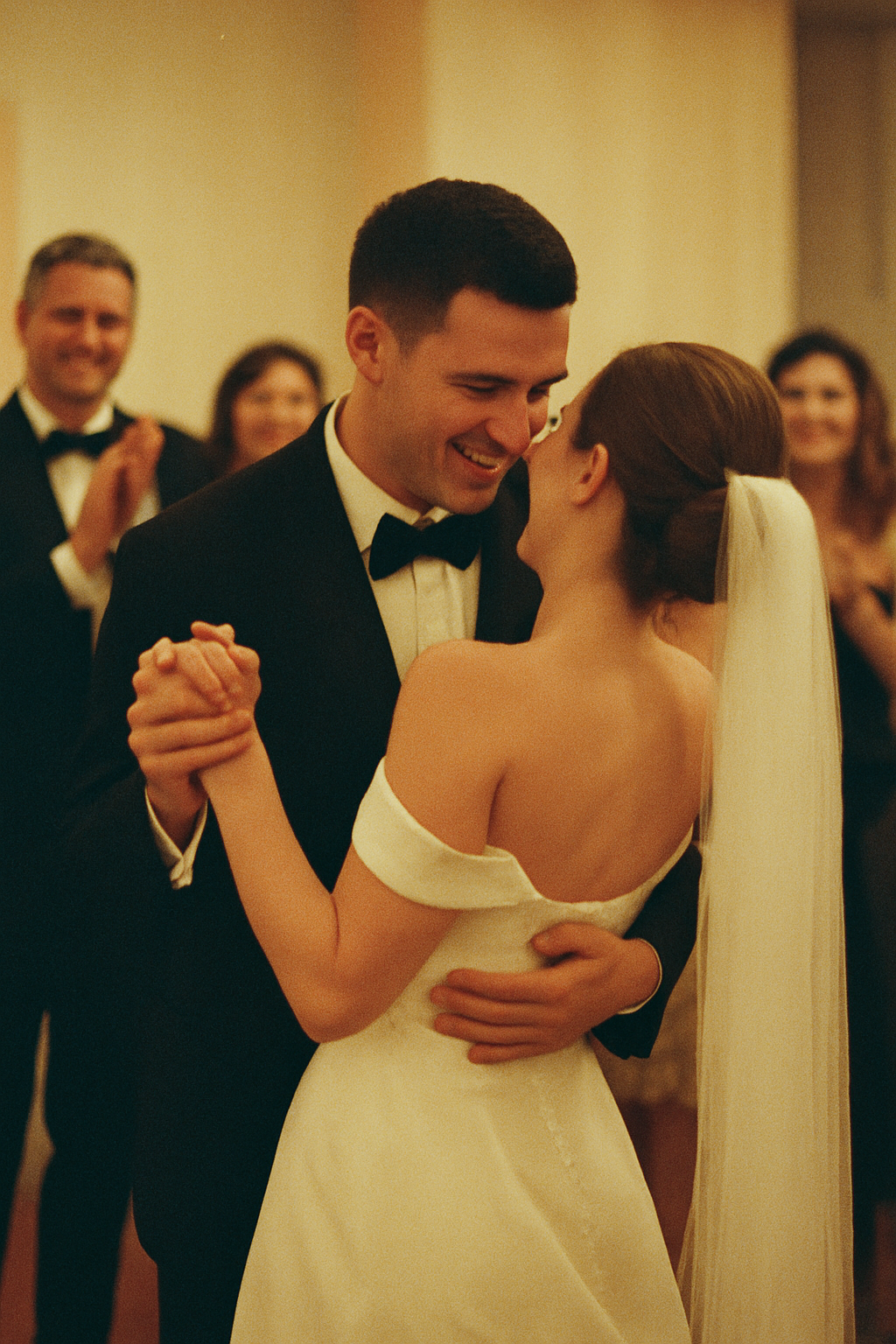 Film photograph of wedding reception moment with nostalgic colors and authentic film grain texture