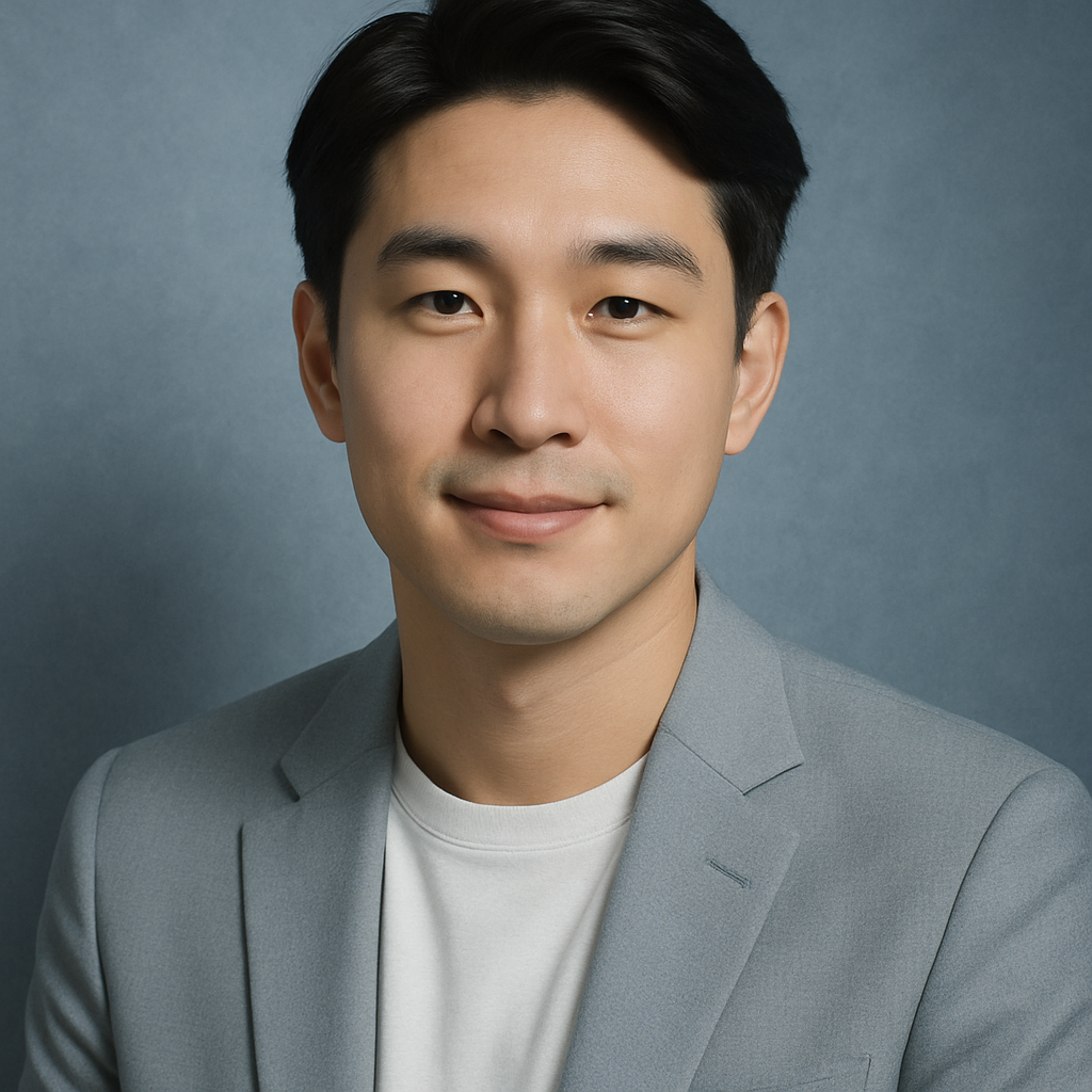 Portrait of David Kim, young East Asian man with neat hairstyle, light gray blazer, approachable, crisp editorial style, cool blue and silver color palette, soft spotlight lighting