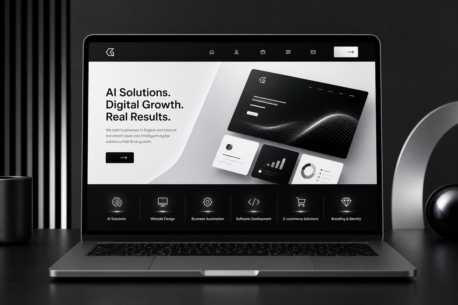 Minimalist corporate website mockup on a laptop with black and silver accents