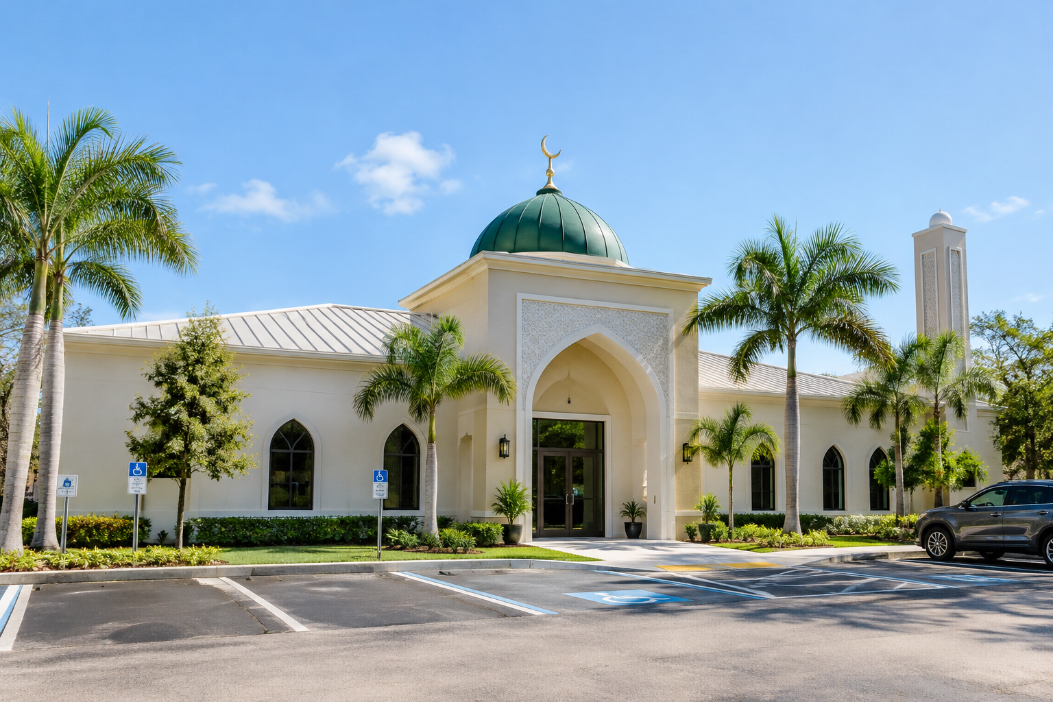 Exterior view of Bonita Springs Muslim Center with entrance and parking area in daylight