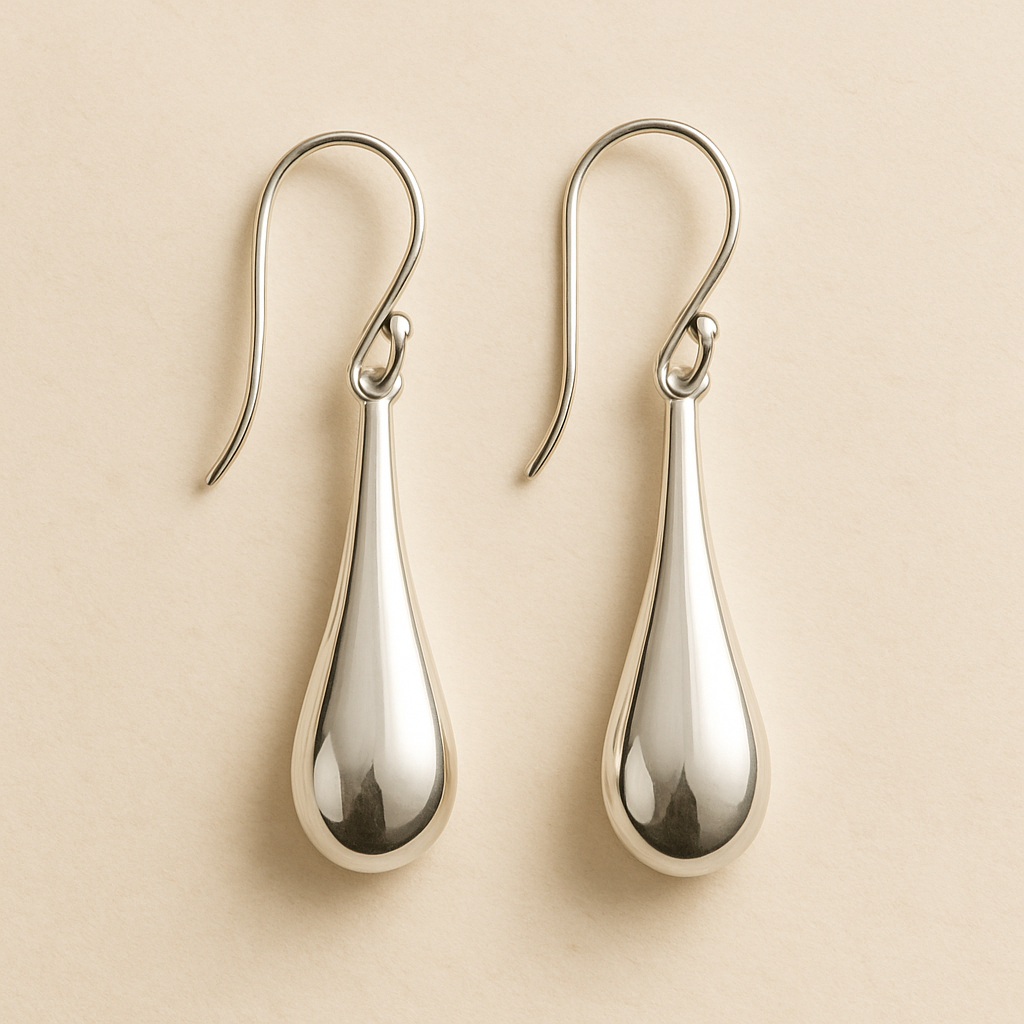 Pair of elegant silver drop earrings with polished finish