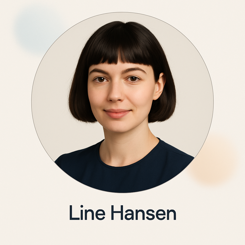 Portrait of Line Hansen, a young woman with dark bob haircut, navy blouse, gentle smile