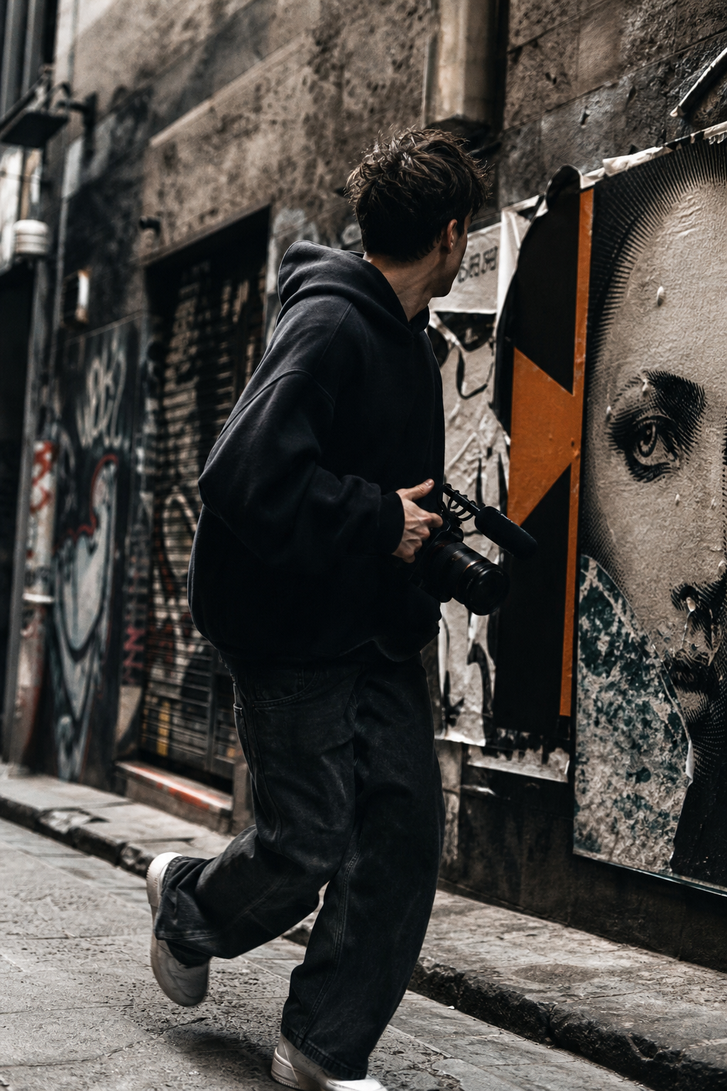 Melbourne laneway brand shoot with textured concrete walls, strong contrast, and candid movement