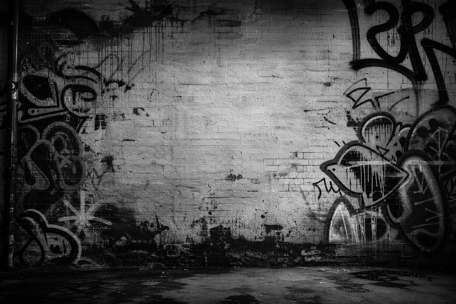 gritty monochrome brick wall with layered street graffiti textures and paint drips, cinematic contrast