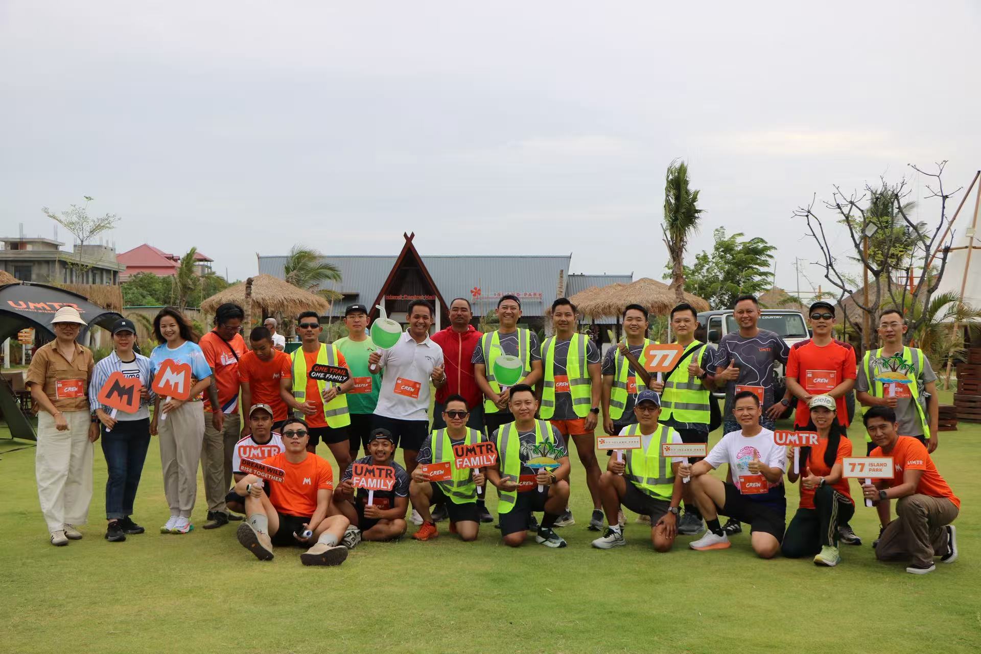 Trail runners and supporters sharing a jungle route during a UMTR community run in Pyin Oo Lwin