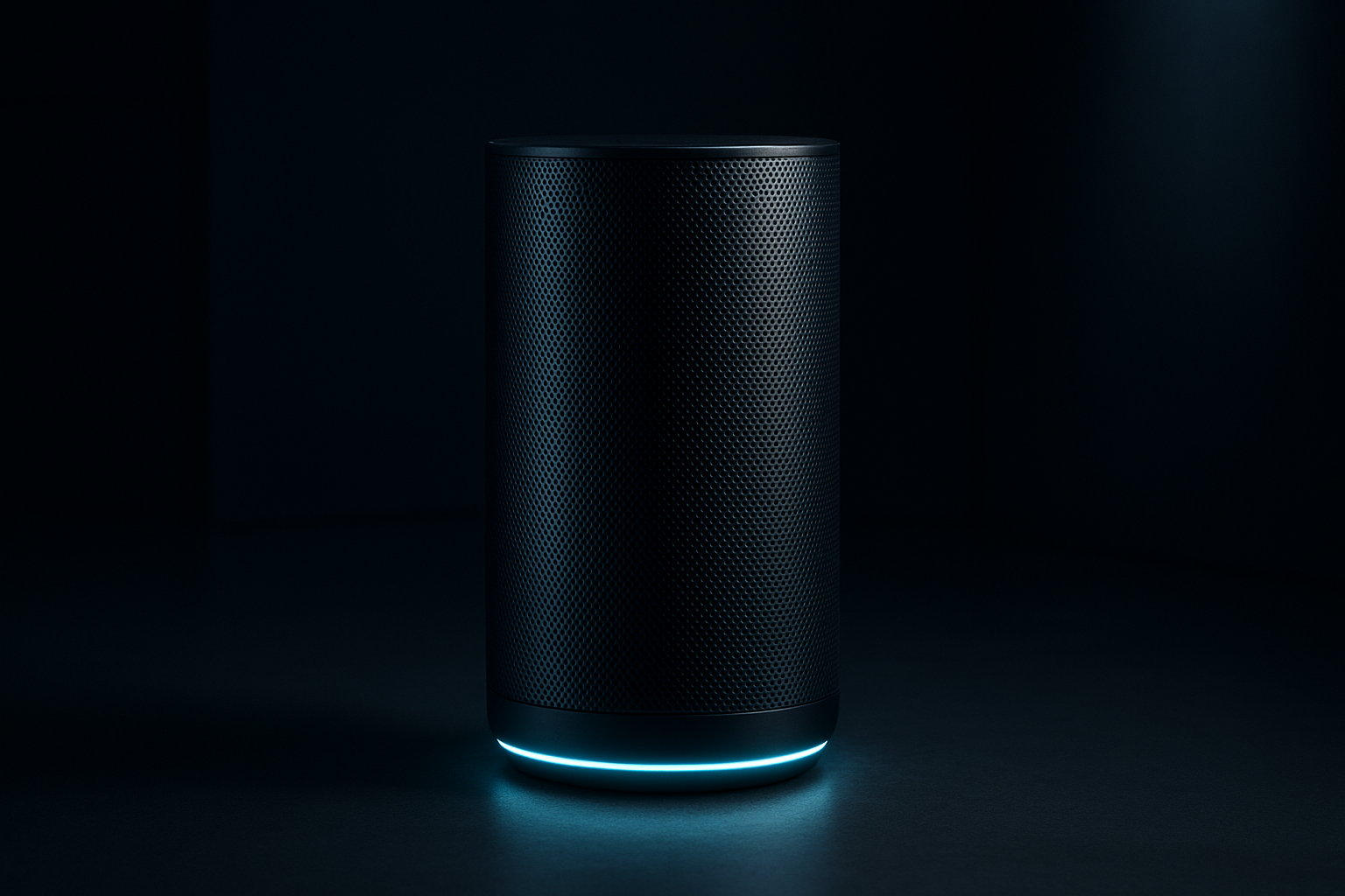 Tall cylindrical wireless speaker in dark aluminum finish with illuminated acoustic rings in a high-end living space
