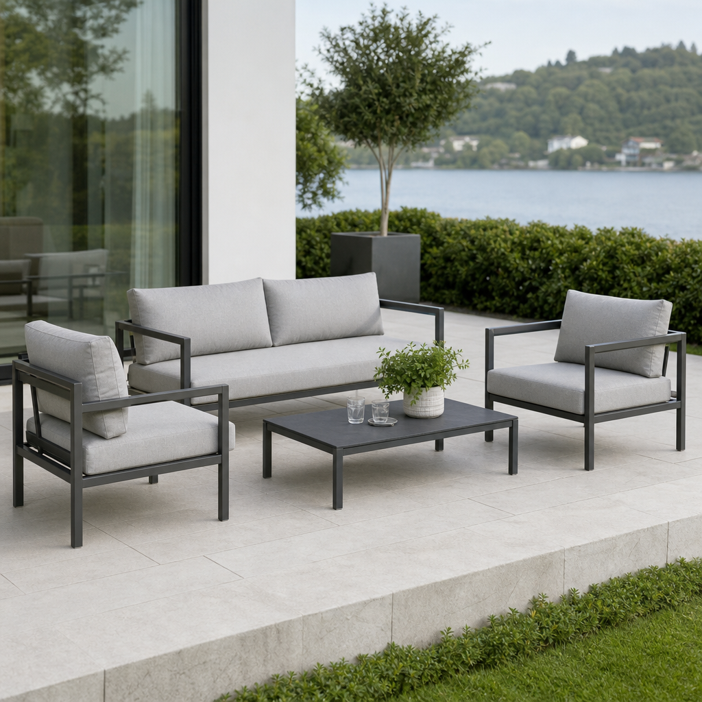 Modern patio lounge chair set with graphite frames and light gray cushions