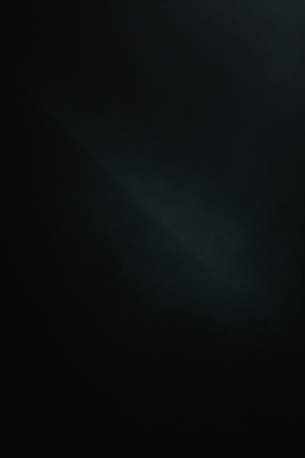 Minimal dark cinematic placeholder with gentle gradient haze