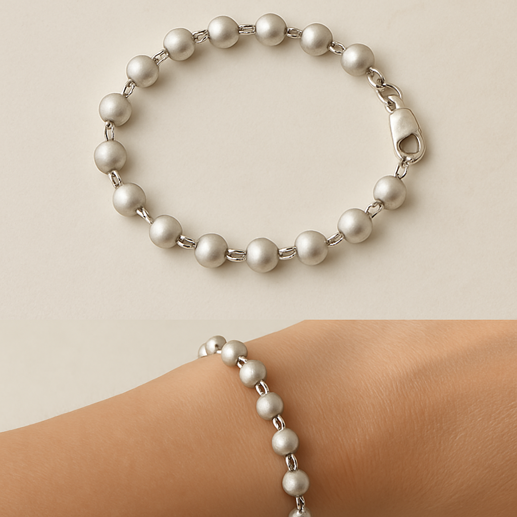 Sterling silver beaded bracelet with matte brushed finish, delicate artisan design