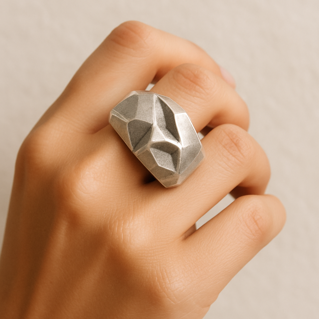 Bold contemporary silver statement ring with sculptural geometric design, handcrafted