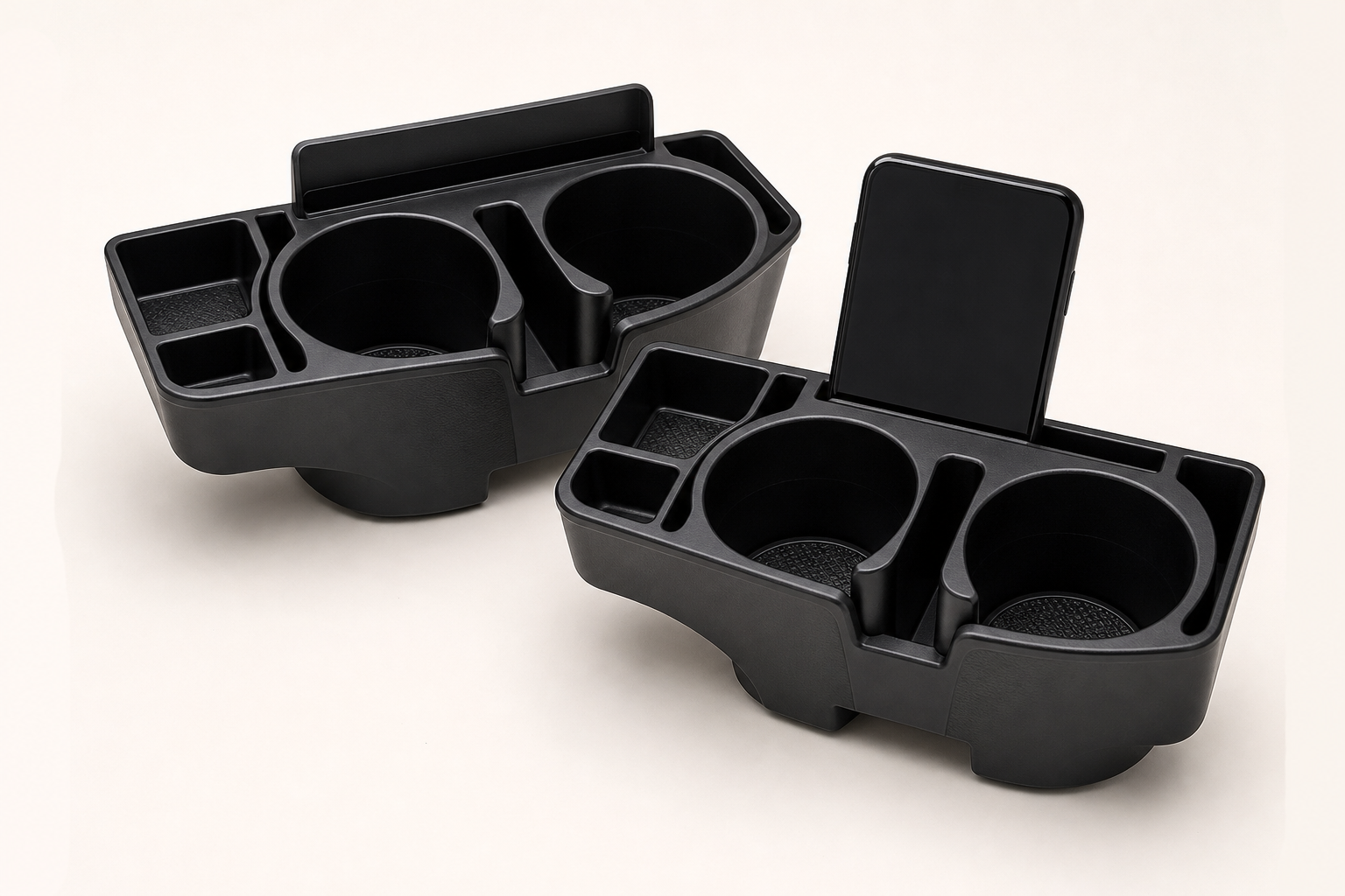 Pair of black car cup holder expansion trays with phone slot and accessory wells