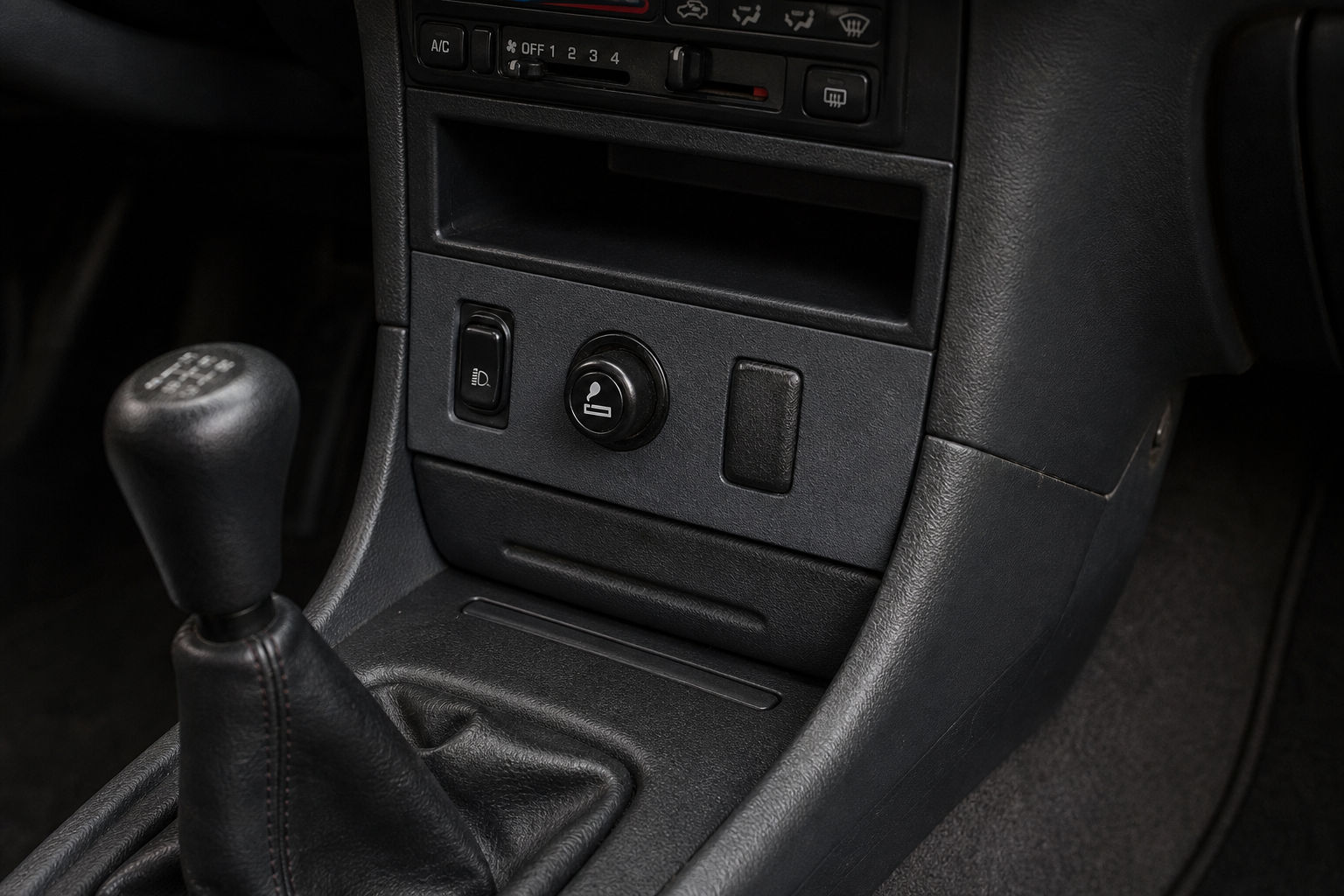 Integra DC2 center console showing a flush-mounted 3D printed switch panel with OEM-style texture.
