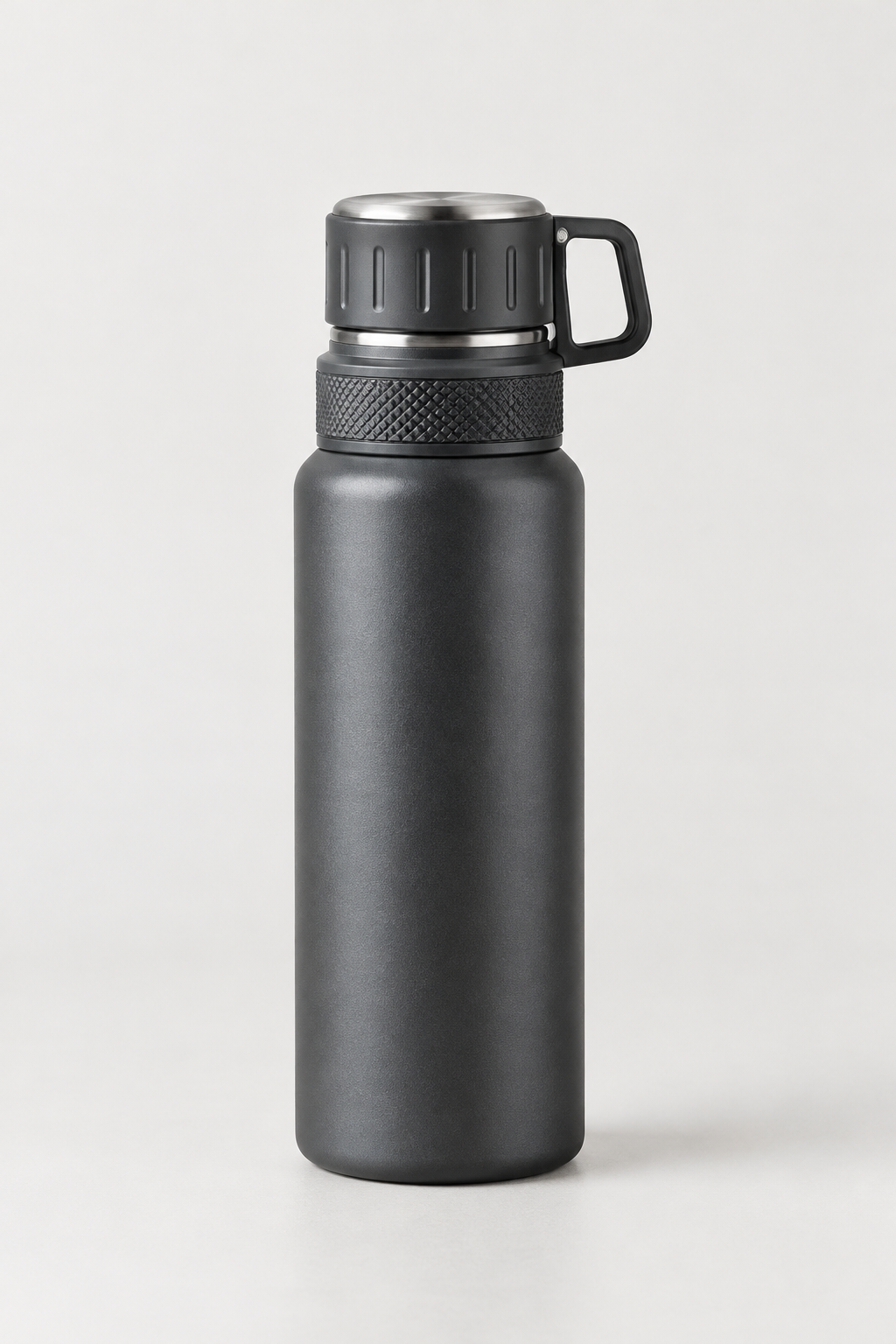 Matte charcoal stainless steel flask bottle with screw cap and textured grip band