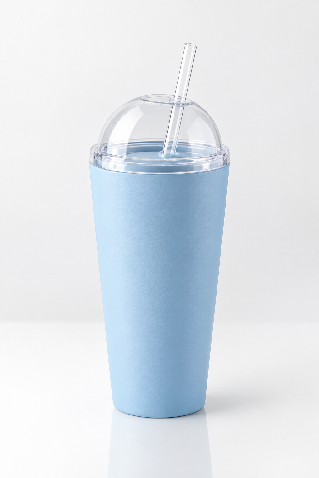 Matte sky-blue straw cup with dome lid and clear reusable straw, angled side view