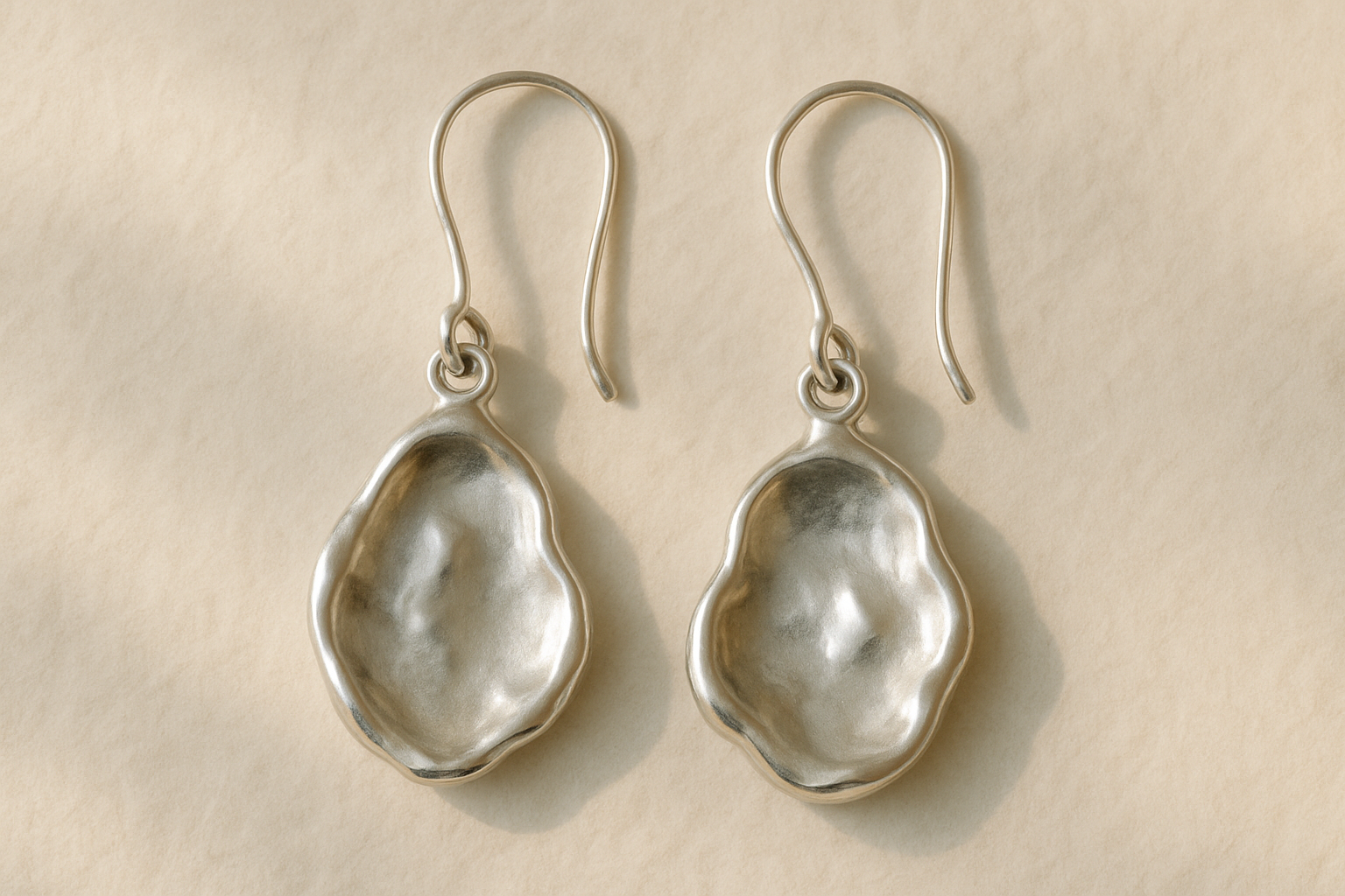 Silver drop earrings with organic shapes