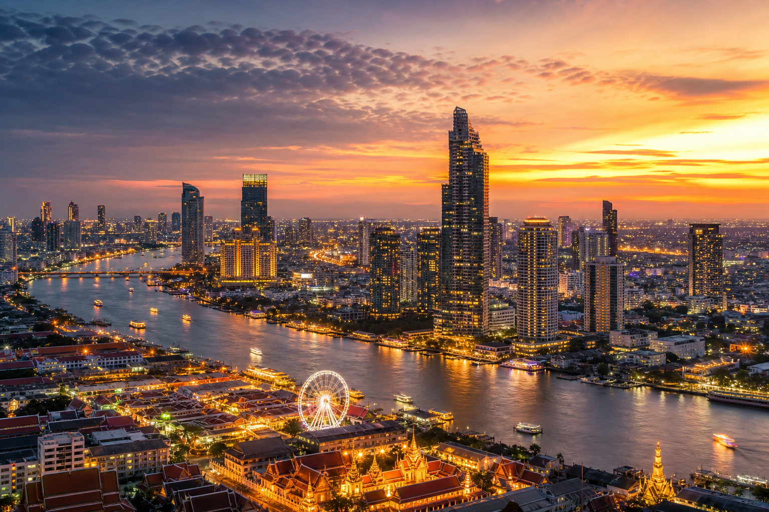 Aerial view of Bangkok skyline at dusk with the Chao Phraya River glowing