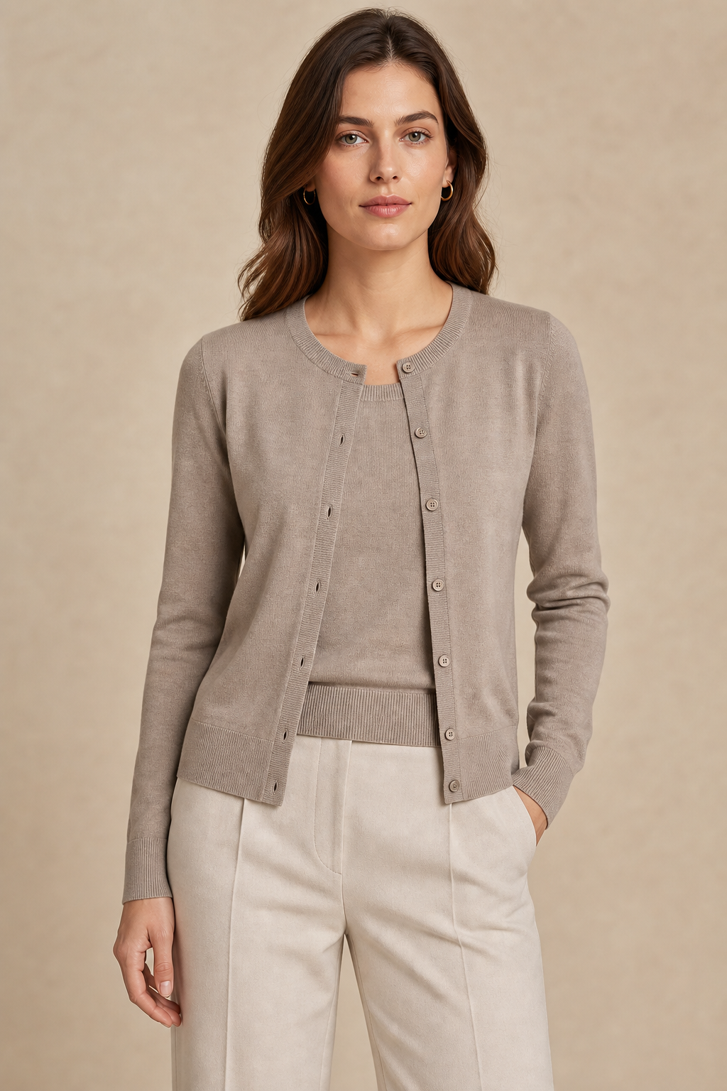 Fine-gauge cardigan and shell set in light taupe knit on a studio model