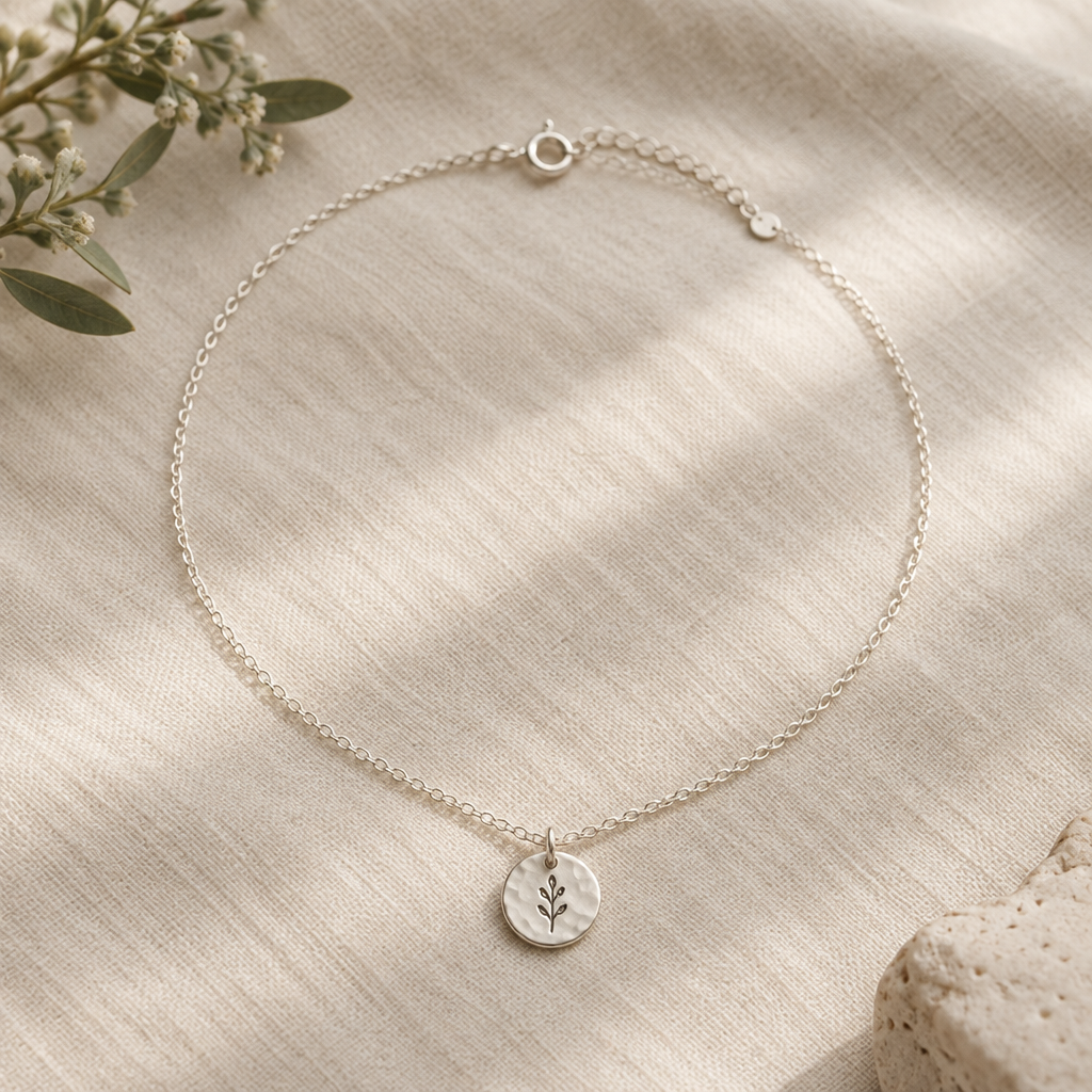 Hand-stamped silver disc necklace on a delicate chain