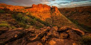 Red sandstone rock formations glowing at sunset