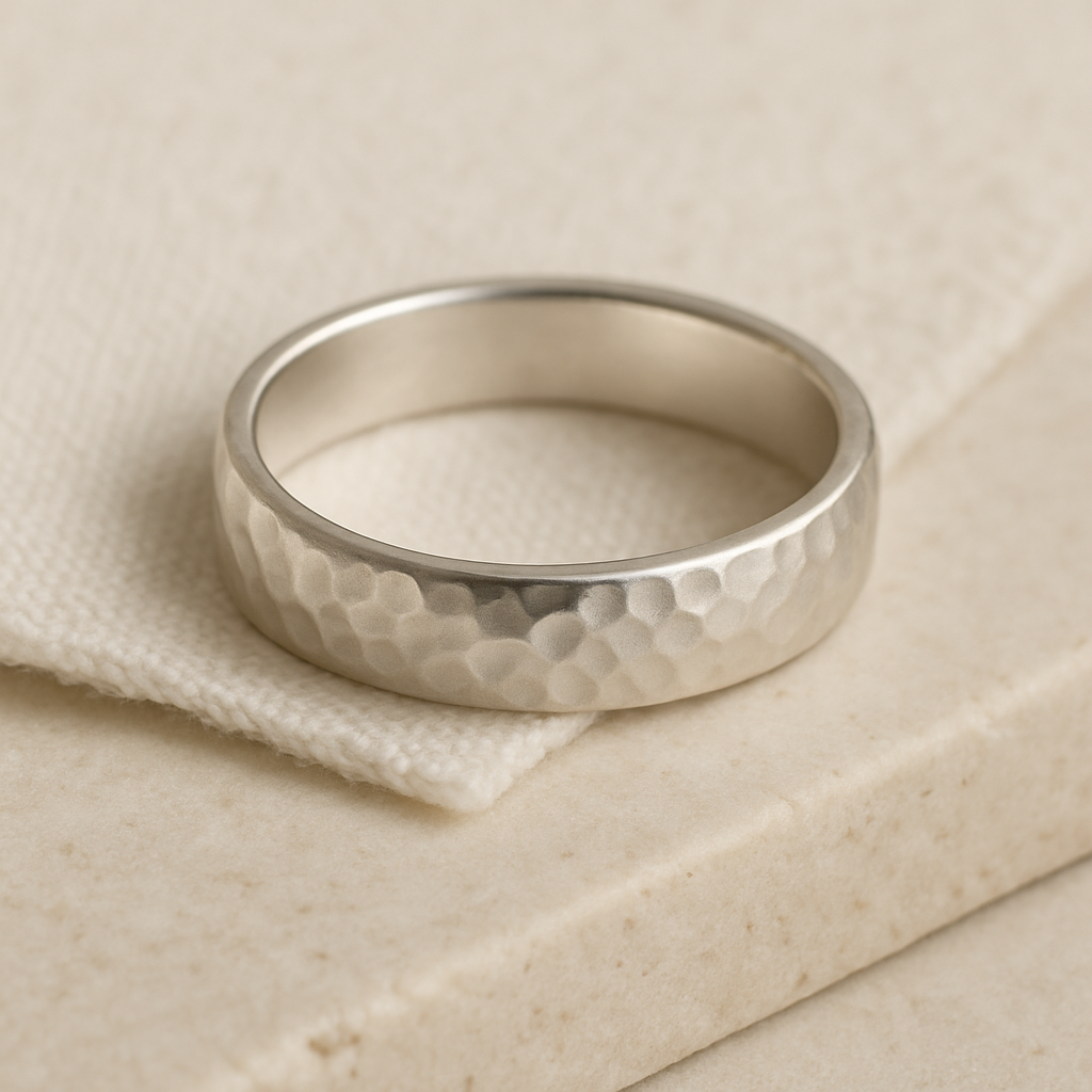 Close-up of a softly textured silver ring