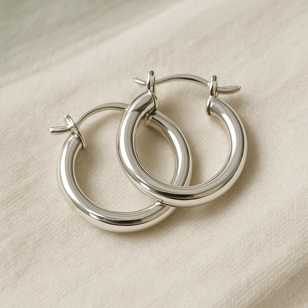 Small rounded sterling silver hoop earrings